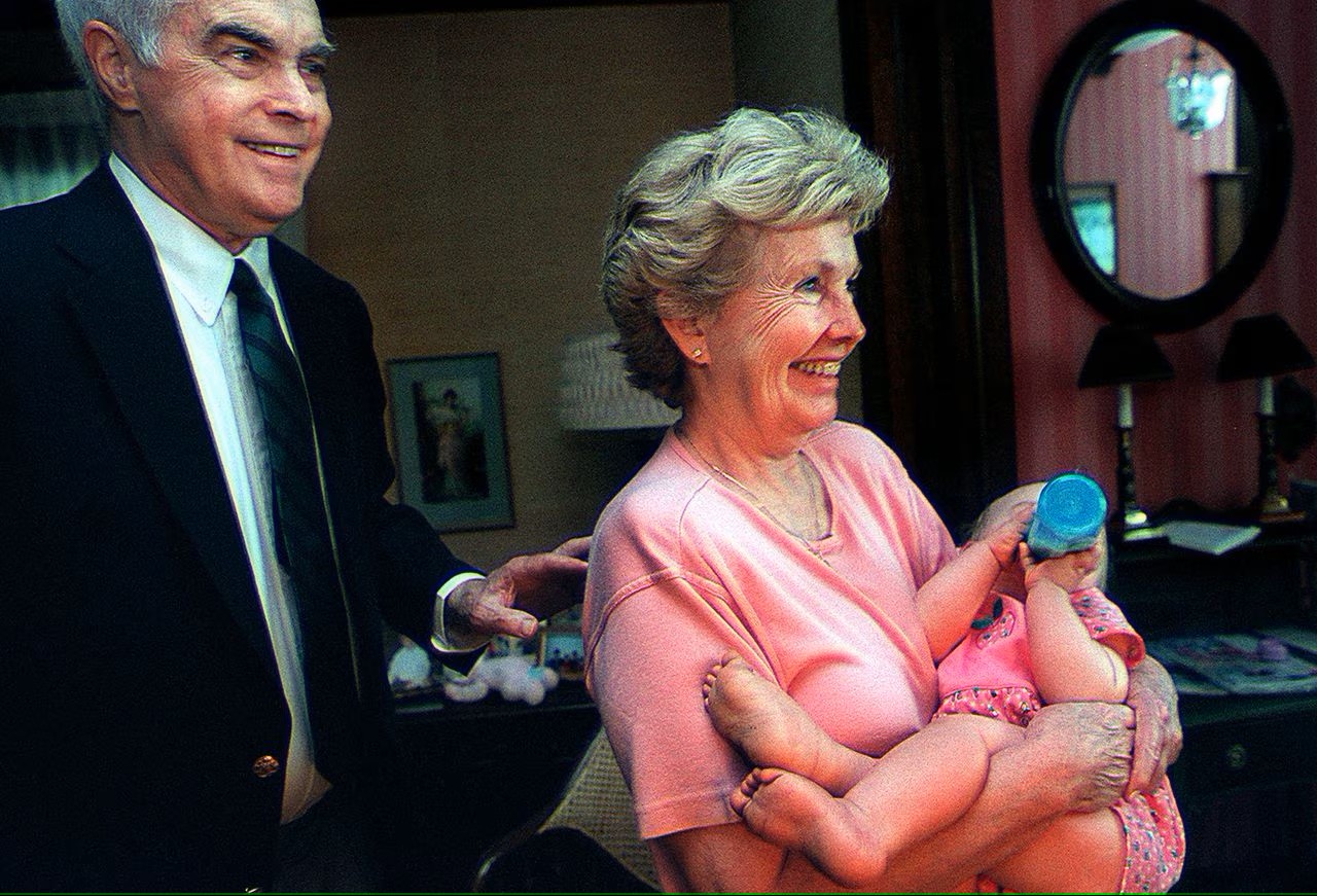 In 1998, former Pa. Gov. Robert Casey stands behind his wife, Ellen Casey, as she holds one of her grandchildren, Clare Philbin, 9 months. (PennLive files)Harrisburg Patriot-News


