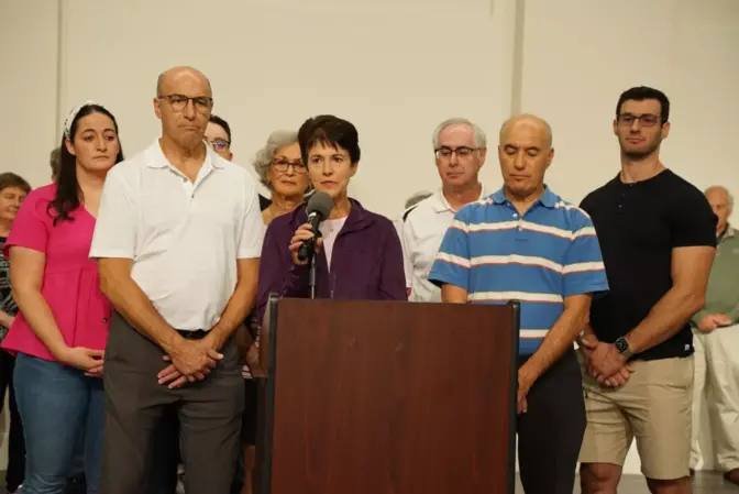 Andrea Wedner, surrounded by family members, addresses the media and community after the Pittsburgh synagogue shooting trail verdict. Wedner's mother, Rose Mallinger, was killed in the 2018 attack.