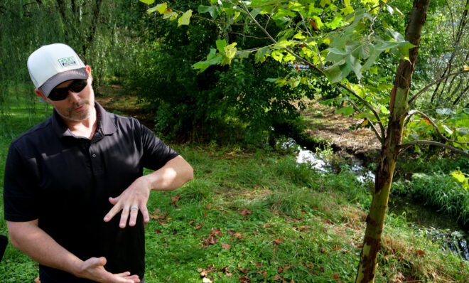 Lester Lanman, Camp Hill Borough public works director, talks about the riparian buffer the borough built along a stream in Willow Park in Camp Hill Borough on Tuesday, Aug. 15, 2023. 