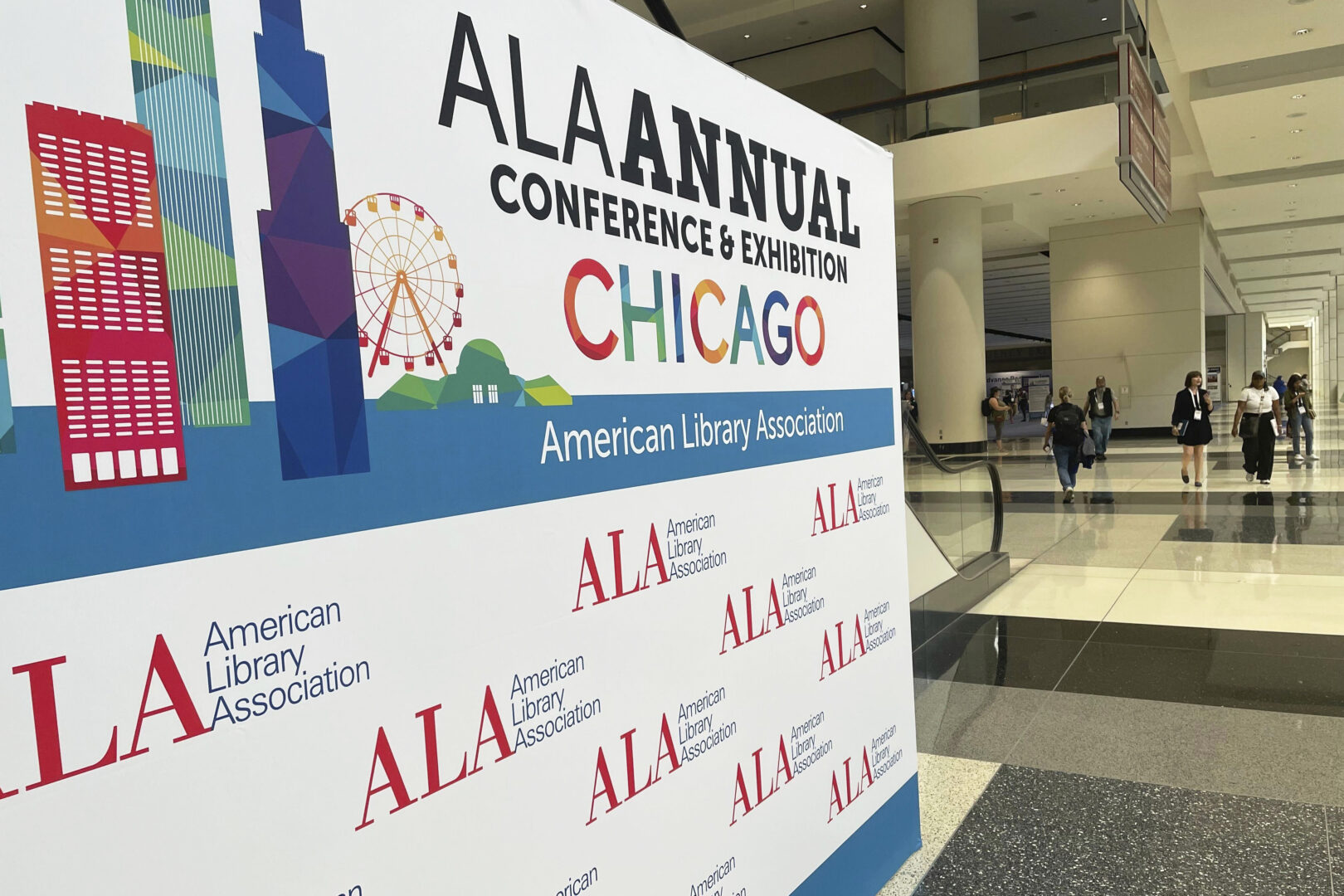 The entrance to the American Library Association annual conference is seen, June 24, 2023, in Chicago. State libraries in three states and some local libraries have severed ties with the ALA amid what some conservatives say has been politicization of the librarian professional organization. ALA officials deny having a political agenda, saying it has always been nonpartisan and that parents should have the freedom to decide what books their children can read. 