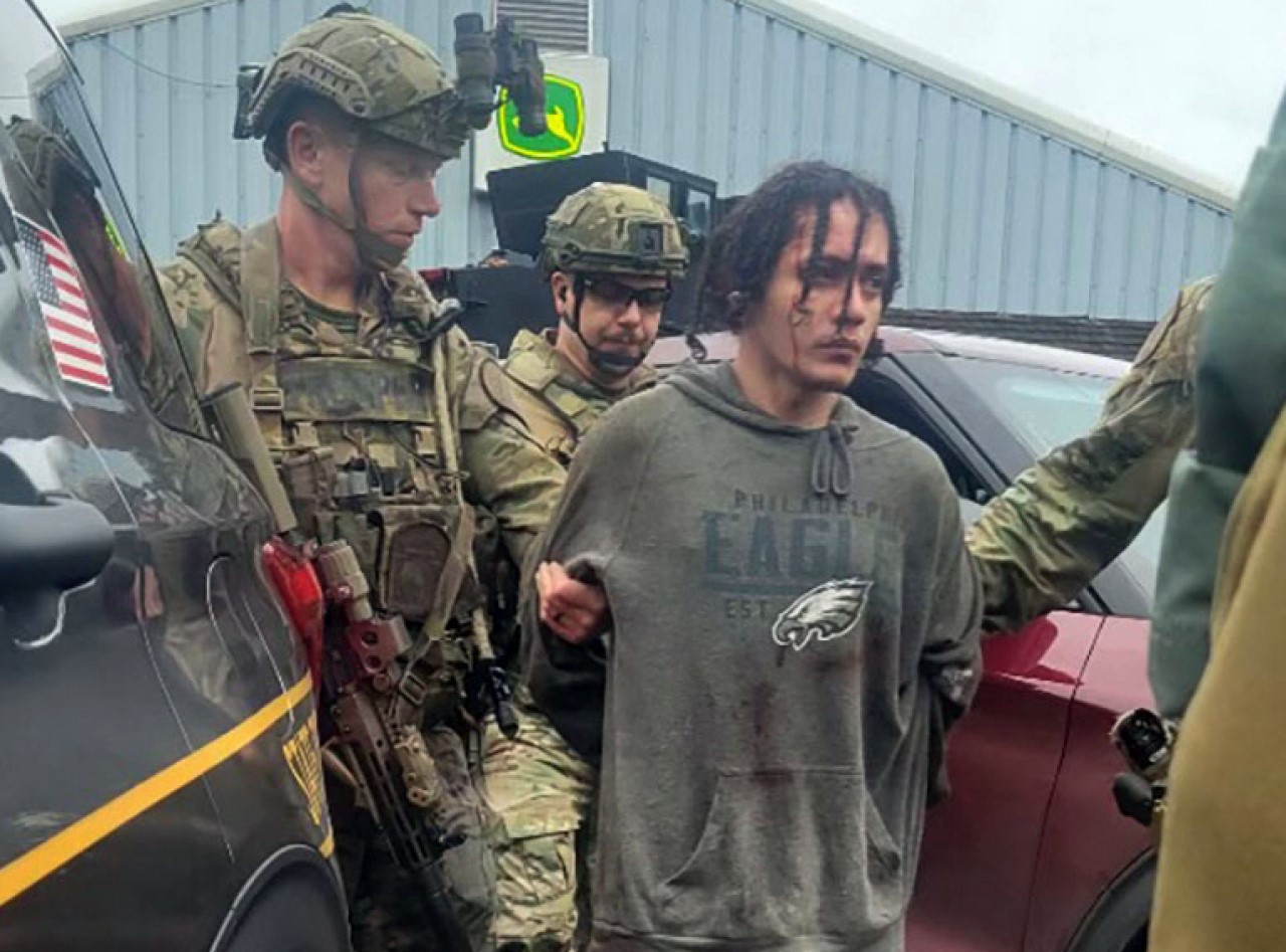 Danelo Souza Cavalcante is taken into custody at the Pennsylvania State Police barracks at Avondale Pa., on Wednesday, Sept. 13, 2023. Cavalcante was captured Wednesday after eluding hundreds of searchers for two weeks.(Pennsylvania State Police via AP)