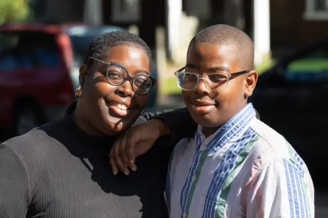 Alisha Gillespie and her 11-year-old son, Zion, on their block in Chester, Pa.