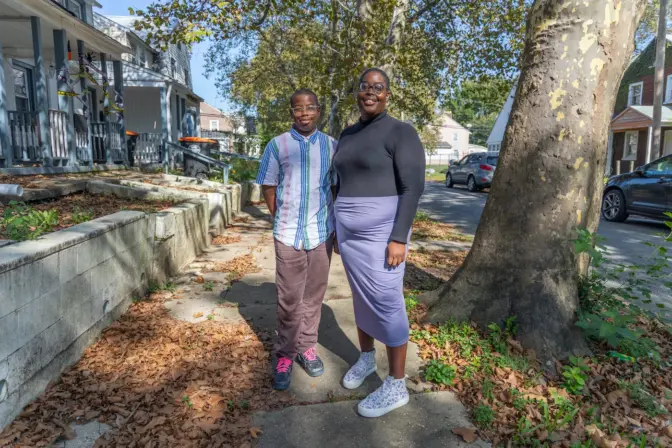 Alisha Gillespie and her 11-year-old son, Zion, on their block in Chester, Pa. 