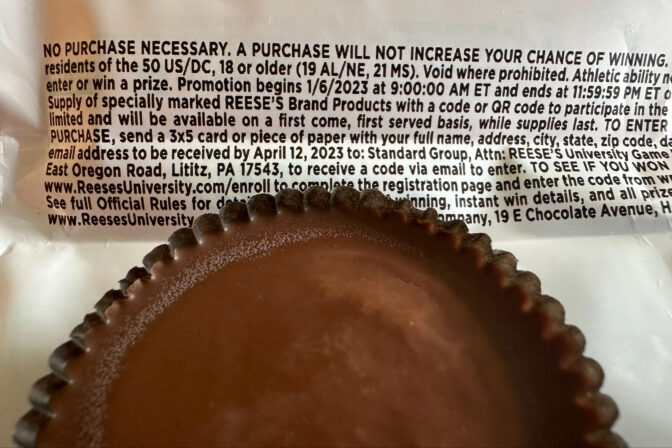 The inside of a Reese's candy wrapper shows details of a sweepstakes offer in this photo taken in Ann Arbor, MI., on Friday, Oct. 13, 2023. Reese's may be violating state and federal laws with the offer.