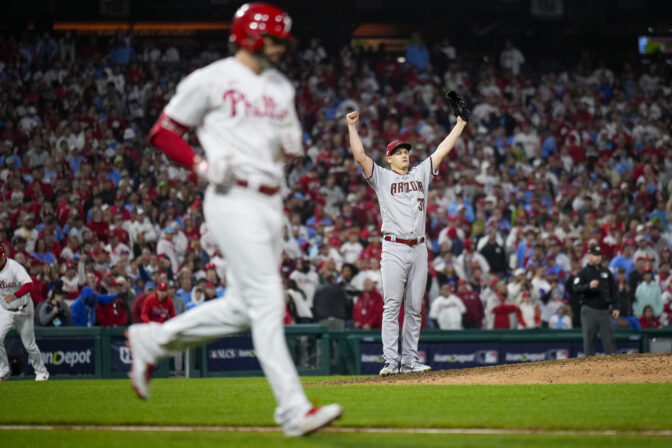 Arizona Diamondbacks relief pitcher Paul Sewald celebrates their win against the Philadelphia Phillies in Game 7 of the baseball NL Championship Series in Philadelphia Wednesday, Oct. 25, 2023. (AP Photo/Matt Slocum)