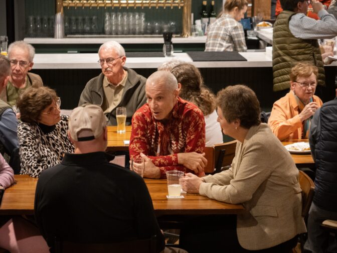 Jonathan Bornman talks to WITF special projects editor Tim Lambert at the News & Brews at the Lititz Shirt Factory on Thursday, Oct. 19, 2023.