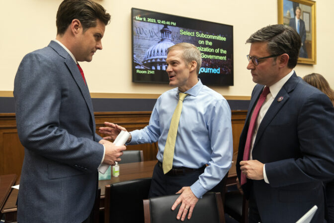 Chairman Jim Jordan, R-Ohio, talks to Reps. Matt Gaetz, R-Fla., and Mike Johnson, R-La., at the conclusion of a House Judiciary subcommittee hearing on what Republicans say is the politicization of the FBI and Justice Department and attacks on American civil liberties, on Capitol Hill in Washington, Thursday, March 9, 2023. (AP Photo/Manuel Balce Ceneta)