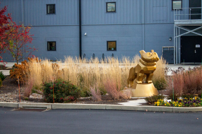 The parking lot at Mack Trucks' Macungie factory sat empty on Wednesday, except for a gold statue of the company's bulldog mascot, and striking workers on the edges of the property.