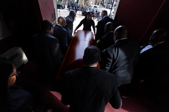 April 11, 2003 - Pallbearers carry the casket of Mel King out the doors of Union United Methodist Church after the conclusion of the funeral service. King — perhaps the city's most prominent modern Black organizer and politician — died on March 28, at age 94.(Jesse Costa/WBUR)