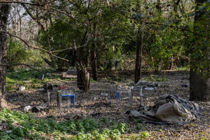 Remnants of camps destroyed by flooding along the river in Pottstown, Pa., in July of 2023. (Kimberly Paynter/WHYY)