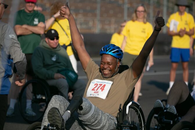 John Wade from Cleveland, Ohio, has a boost of confidence right before the start signal in the National Veterans Wheelchair Games at the Portland International Raceway on July 5, 2023. The National Veterans Wheelchair Games brought in about 460 veterans to compete in all kinds of sporting events.