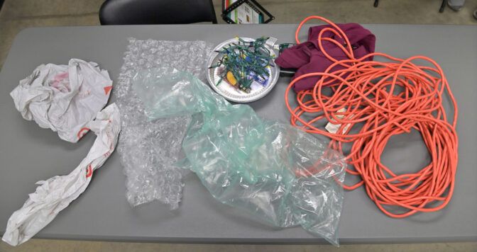 Items called stranglers sit on a table at the Penn Waste facility in York on Tuesday, Nov. 21, 2023. Extension cords, plastic bags or packaging plastic, Christmas lights and clothing do not belong in our recycling bins, and must be pulled from the conveyor belts of the plant should they be found.