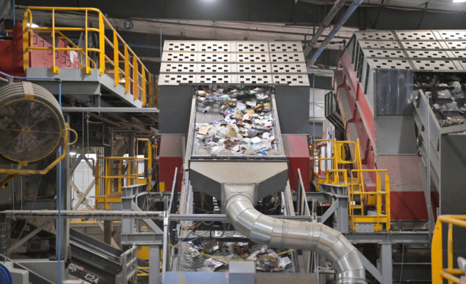 Trash moves along on a conveyor belt at the Penn Waste facility in York on Tuesday, Nov. 21, 2023.