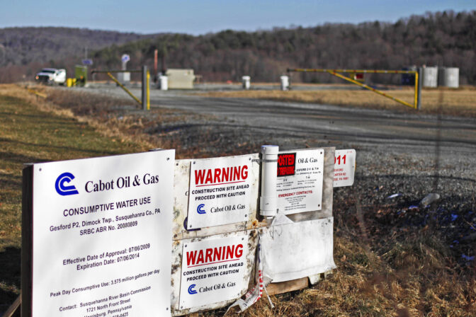 File – This Feb. 13, 2012, file photo shows a Cabot Oil Gas Corp. wellhead in Dimock, Pa. A year after pleading no contest to criminal charges, Coterra Energy Inc., one of Pennsylvania’s biggest natural gas companies, is poised to drill and frack in the rural community where it was banned for a dozen years over accusations it polluted the water supply. (AP Photo/Matt Rourke, File)