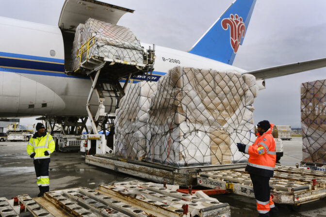 FILE - Ground crew at the Los Angeles International airport unload pallets of supplies of medical personal protective equipment, PPE, from a China Southern Cargo plane upon arrival on Friday, April 10, 2020. Some states that stockpiled millions of masks and other personal protective equipment during the coronavirus pandemic are now throwing the items away. (AP Photo/Richard Vogel, File)