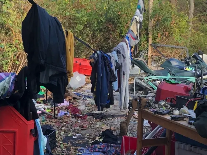 Wet clothes hang to dry on a makeshift clothesline at a Montgomery County encampment in late November, after it rained the two days prior. (Mark Boorse, Access Services)