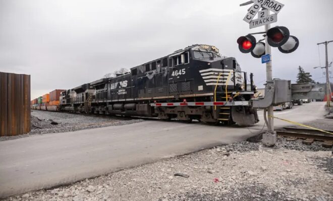 A Norfolk Southern train going through East Palestine on January 6, 2024, 11 months after one of its trains derailed there, setting off fires and chemical releases. Photo: Renee Rosensteel for The Allegheny Front
