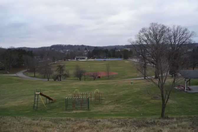 Norfolk Southern has promised to spend $25 million renovating and updating the East Palestine city park, including renovating the pool, building new playgrounds and adding an amphitheater to this hillside.