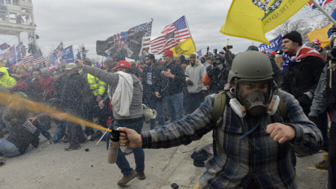 Trump supporters clash with police and security forces as people try to storm the US Capitol Building in Washington, DC, on January 6, 2021. - Demonstrators breeched security and entered the Capitol as Congress debated the a 2020 presidential election Electoral Vote Certification. (Photo by Joseph Prezioso / AFP) (Photo by JOSEPH PREZIOSO/AFP via Getty Images)