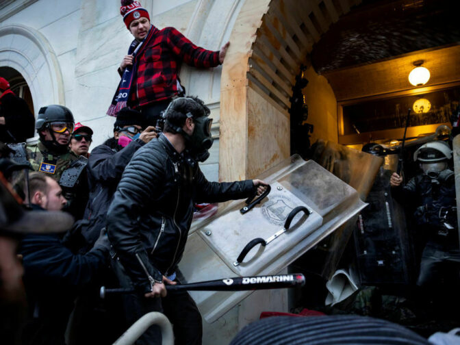 WASHINGTON, DC - JANUARY 6: Trump supporters clash with police and security forces as people try to storm the US Capitol on January 6, 2021 in Washington, DC. - Demonstrators breeched security and entered the Capitol as Congress debated the 2020 presidential election Electoral Vote Certification. (photo by Brent Stirton/Getty Images)