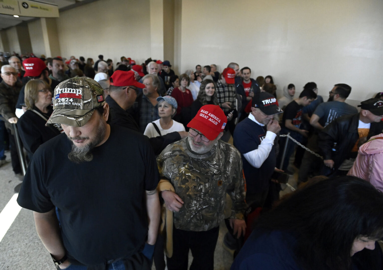Supporters stand in line before former President Donald Trump speaks at an NRA sponsored event at the Great American Outdoor Show in Harrisburg Friday Feb. 9, 2024.