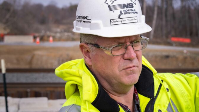 Christopher Hunsicker, Norfolk Southern's regional manager of environmental operations, gives a tour of the cleanup site he's been in charge of since the immediate wake of the February 2023 train derailment in East Palestine, Ohio. (Elizabeth Gillis/NPR)