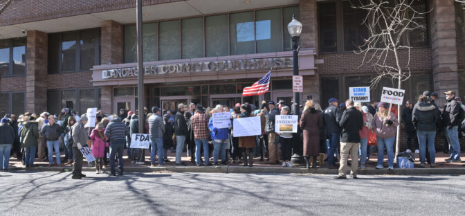 People protest against the government and the FDA outside Lancaster County Courthouse during a hearing regarding farmer Amos Miller's raw-dairy business on Thursday, Feb. 29, 2024.