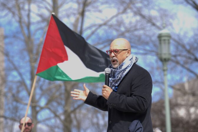 Philadelphia Democratic state Rep. Chris Rabb spoke to a crowd of Palestine supporters before they staged a "die-in" outside of state Treasurer Stacy Garrity's office.