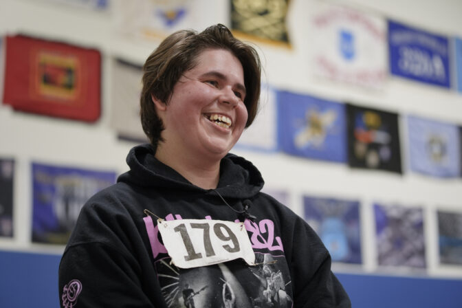 Philadelphia Police Academy applicant Megan Bortner speaks after completing the physical fitness entry exam in Philadelphia, Saturday, Feb. 24, 2024. The city has moved to lower requirements for the entry physical exam at its police academy as part of a broader effort nationally to reevaluate policies that keep law enforcement applicants out of the job pool amid a hiring crisis. (AP Photo/Matt Rourke)