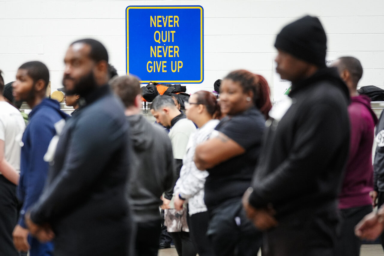 Philadelphia Police Academy applicants wait to begin the physical fitness portion of the entry exam in Philadelphia, Saturday, Feb. 24, 2024. The city has moved to lower requirements for the entry physical exam at its police academy as part of a broader effort nationally to reevaluate policies that keep law enforcement applicants out of the job pool amid a hiring crisis. (AP Photo/Matt Rourke)