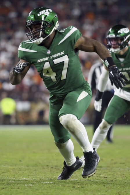 FILE - New York Jets linebacker Bryce Huff (47) runs after the ball during an NFL football game against the Cleveland Browns, Thursday, Dec. 28, 2023, in Cleveland. The Philadelphia Eagles have agreed to contracts with former New York Giants running back Saquon Barkley and former New York Jets defensive end Bryce Huff, two people familiar with the deals told The Associated Press on Monday, March 11, 2024.(AP Photo/Kirk Irwin, File)