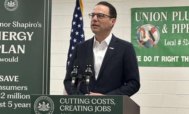 Pennsylvania Gov. Josh Shapiro speaks at a news conference at the United Association Local 524 union building in Scranton, Pa., on Wednesday, March 13, 2024. Shapiro announced he would back legislation to make power plant owners in Pennsylvania pay for their planet-warming greenhouse gas emissions and require utilities in the nation's third-biggest power-producer to buy more electricity from renewable sources. (AP Photo/Michael Rubinkam)