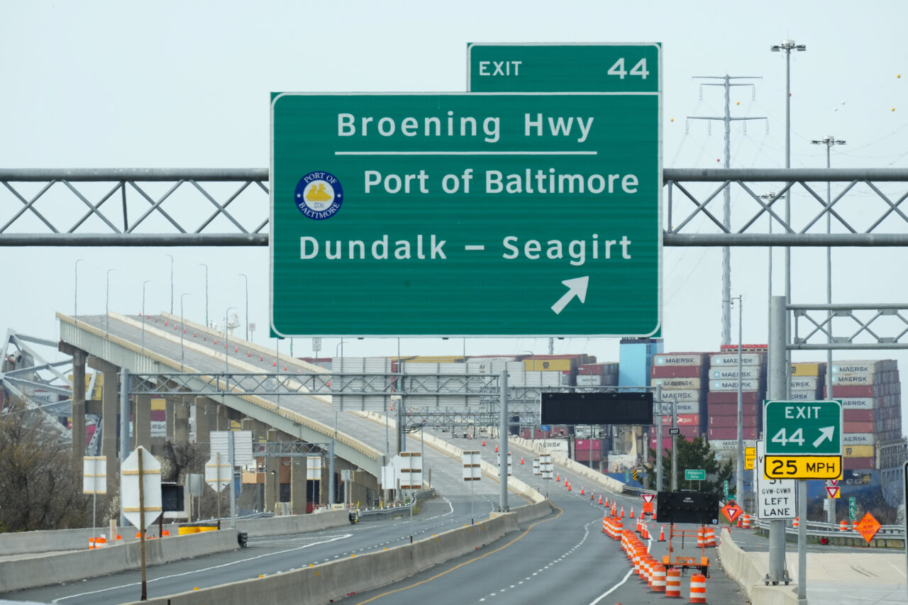 A container ship as it rests against wreckage of the Francis Scott Key Bridge on Tuesday, March 26, 2024, as seen from Dundalk, Md. The ship rammed into the major bridge in Baltimore early Tuesday, causing it to collapse in a matter of seconds and creating a terrifying scene as several vehicles plunged into the chilly river below. (AP Photo/Matt Rourke)