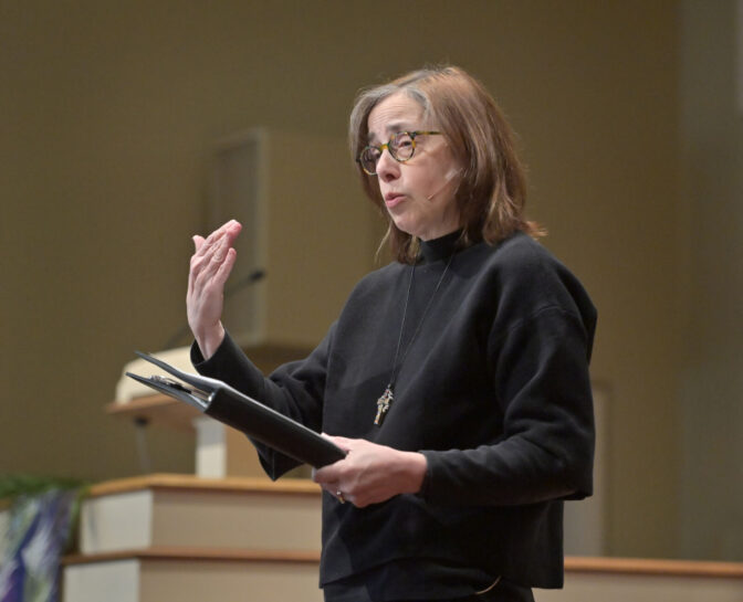 Rev. Andrea Brown speaks with her congregation during Palm Sunday service at the Grandview Church on Sunday, March 24, 2024.