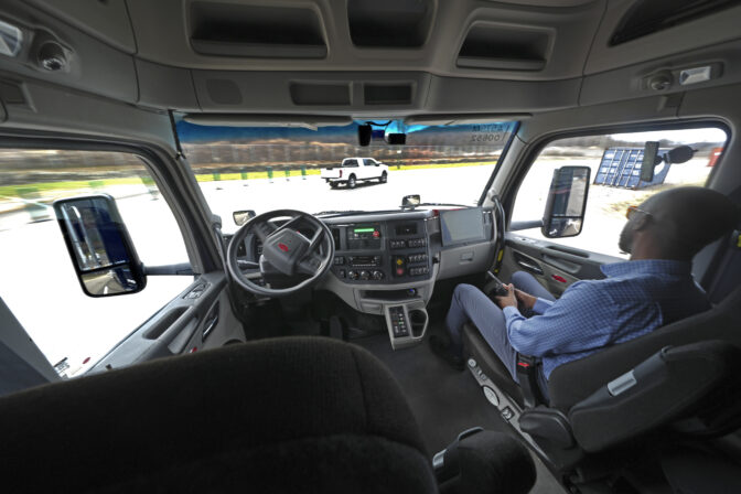The interior of the cab of a self driving truck is shown as the truck maneuvers around a test track in Pittsburgh, Thursday, March 14, 2024. The truck is owned by Pittsburgh-based Aurora Innovation Inc. Late this year, Aurora plans to start hauling freight on Interstate 45 between the Dallas and Houston areas with 20 driverless trucks. (AP Photo/Gene J. Puskar)