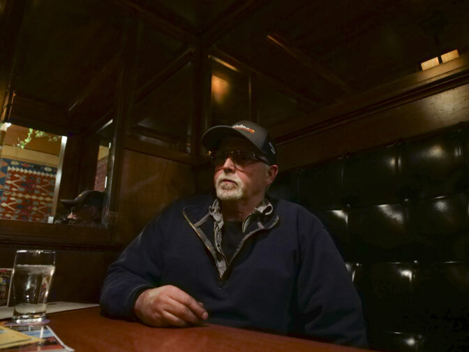 Gene Potter, seen here at McMenamin's Olympic Club on March 6, 2024, has been a machinist at the Centralia Coal Plant for decades. He's concerned new industries won't offer the same wages or quality of life as the coal plant. (Jeremy Long - WITF)