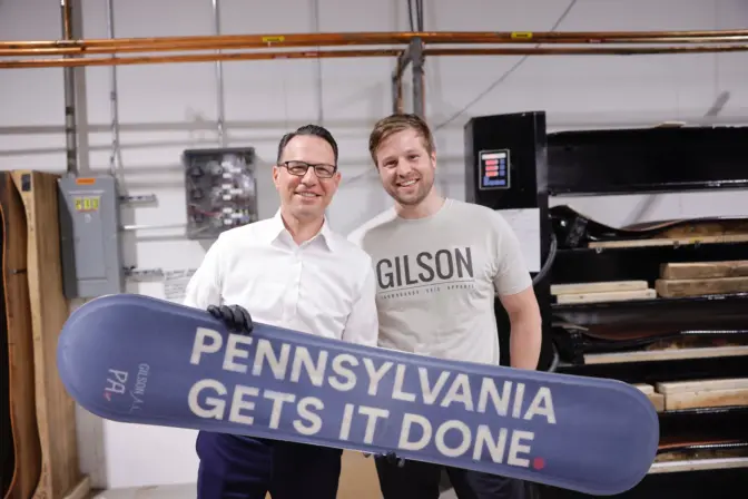Pennsylvania Governor Josh Shapiro, left, who announced the PA Outdoor Business Alliance at Gilson Snow in Selinsgrove, is with owner Nick Gilson.