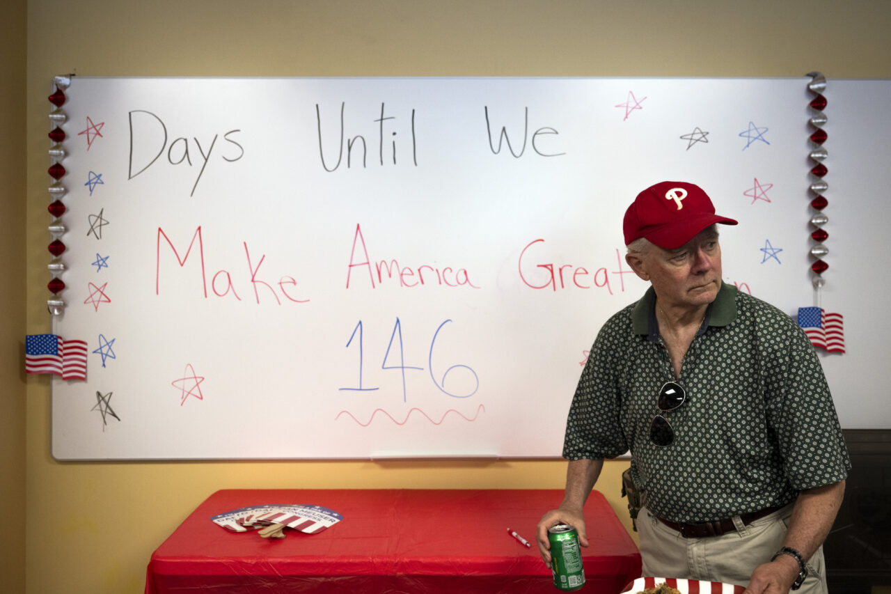 Attendees gather as the "Latino Americans for Trump" office opens in Reading, Pa., Wednesday, June 12, 2024. (AP Photo/Joe Lamberti)