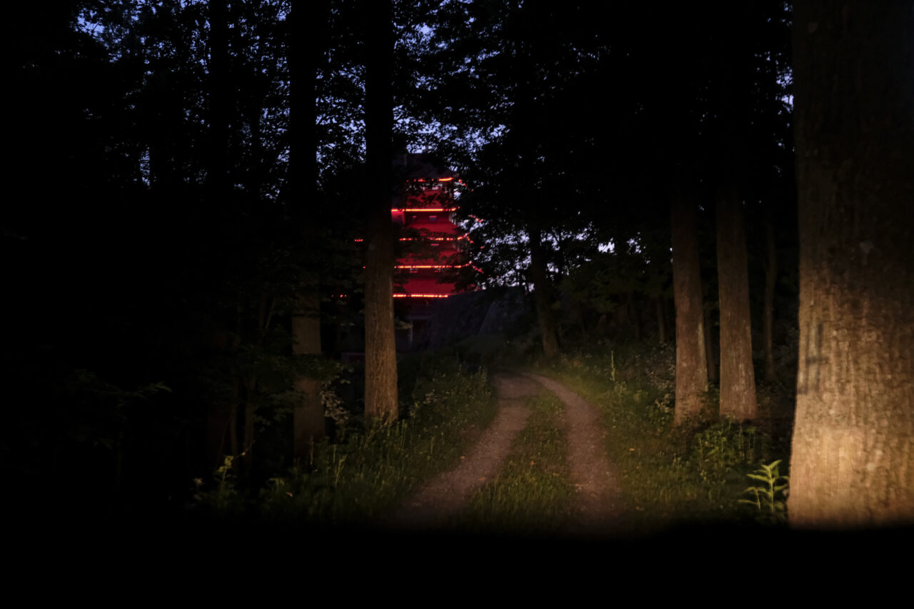 The Reading Pagoda, a historic landmark and symbol of the city in Pennsylvania for more than a century is illuminated at night atop Mount Penn, Pa., on Sunday, June 16, 2024. (AP Photo/Luis Andres Henao)