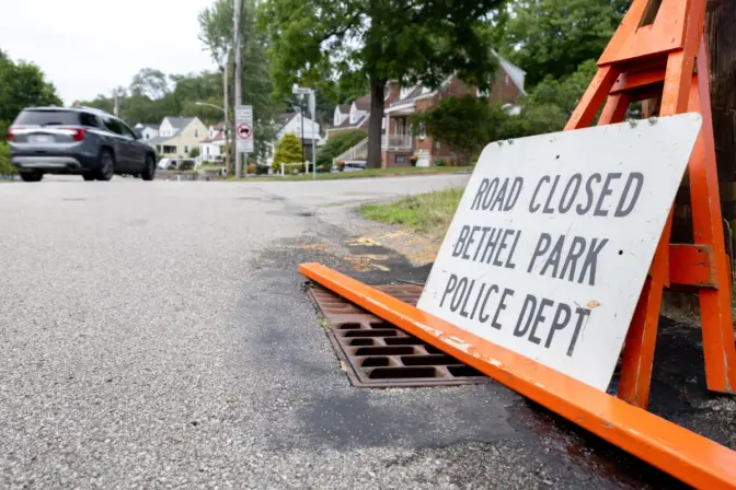 In the days following the shooting, investigators closed off the street where the gunman lived.