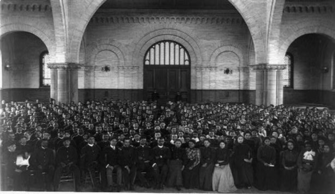 Students gathered for an assembly at Hampton Institute in Hampton, Va., about 1900.