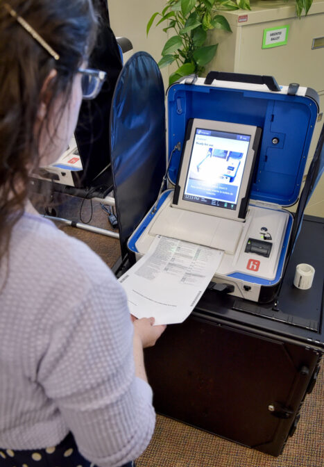April Wefler demonstrates the county's new voting machines. Friday, October 4, 2019