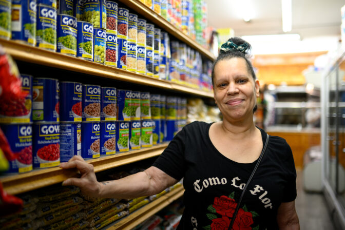 Sonia Concepcion stands for a portrait at 5th Street Supermarket in the Hunting Park neighborhood of Philadelphia on Friday, September 20, 2024. CREDIT: Kriston Jae Bethel for NPR