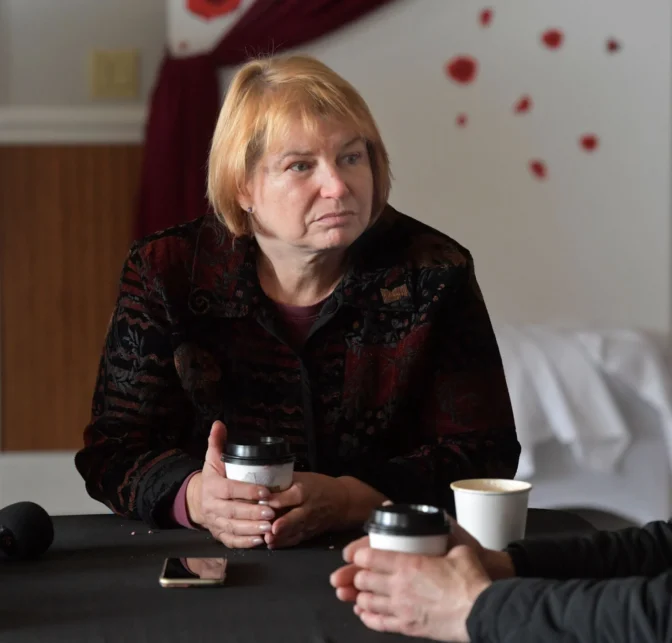 Laura Stammberger of Lititz, listens as she translates for Vitalii and Yana, both Ukrainian refugees in Lancaster County, as they speak with a reporter after attending church at Brickerville Grace Fellowship in Lititz on Sunday, Feb. 23, 2025. The couple are now facing uncertain times after Trump immigration policies have started taking place across the nation.