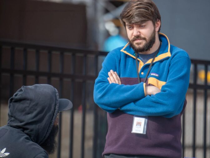 Tenfold outreach worker Thomas Tuten, right, talks with a homeless client at Culliton Park in the 200 Block of South Water Street in Lancaster city on Thursday, Feb. 27, 2025.