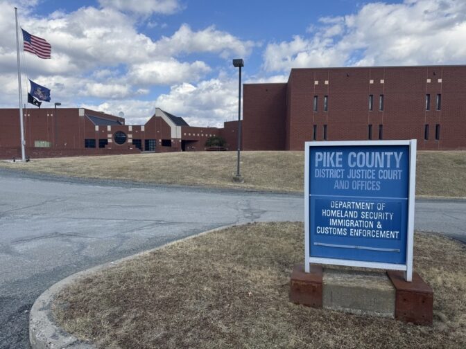 Family of one of the men detained met with Nepali-speaking community leader Tilak Niroula, far right, and Dauphin County Commissioner Justin Douglas at Pike County Correctional Facility before visiting detained family members. 