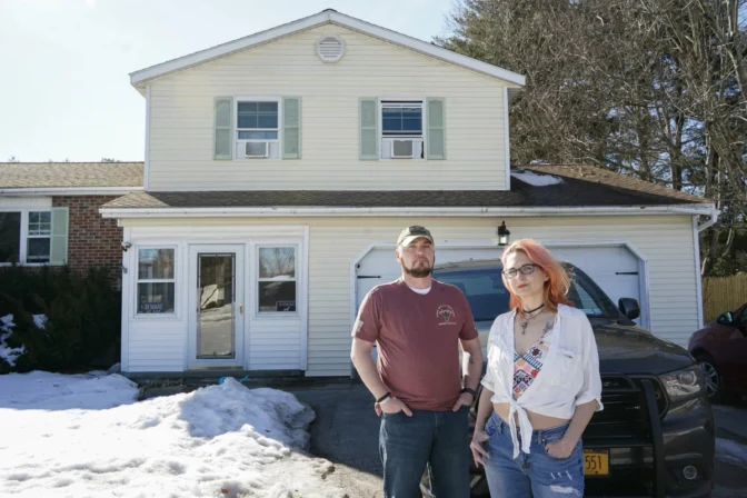 Kevin Conlon and his wife, Jenny, at their home in upstate New York. The couple have owned the house for 12 years and don't know where they would go if they lose it.