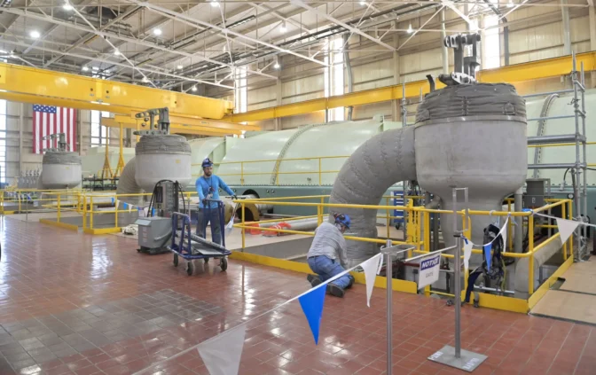 Two workers as viewed during a media tour held by Constellation at the Crane Clean Energy Center, formerly known as Three Mile Island, where media could visit the turbine building where progress toward the restart of the nuclear reactor is taking place after the facility closed in 2019 on Wednesday, June 25, 2025. The turbine is a component in making electricity. A large, multi-stage machine converts energy of high-pressure steam into rotational mechanical energy. This energy is used to drive an electrical generator that produces electricity. Constellation announced the signing of a 20-year power purchase agreement with Microsoft that will pave the way for the launch of CCEC and the restart of TMI Unit 1, which operated for decades before shutting down five years ago.