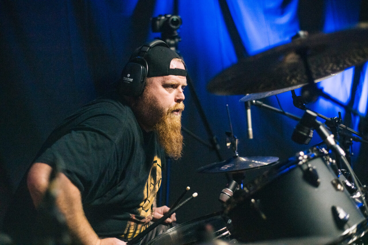 Paul Cochran at the drums.