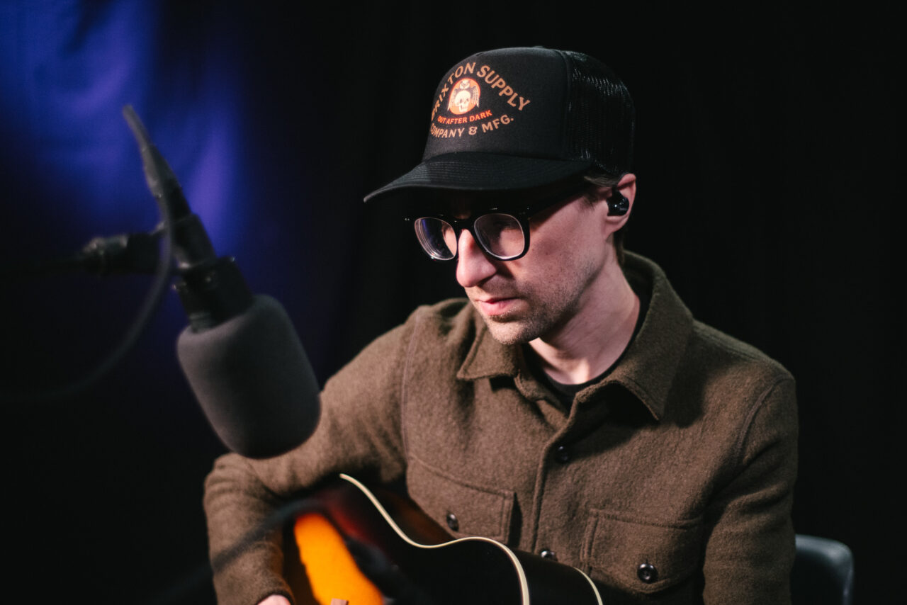 Roland Lewis performing in the studio.